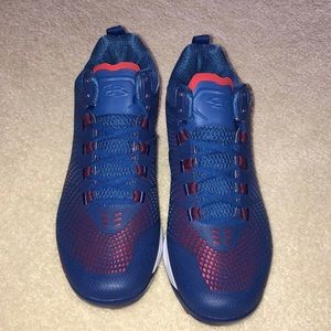 Red white and blue softball cleats